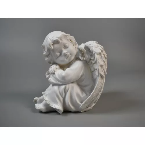 Angyal üldögélő nagy fehér