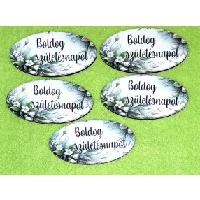    Nyomtatott fa alapú HDF(nem tömörfa) ovális tábla zöld virágos  hátér Boldog születésnapot felirattal 	5db/csomag	8x4cm vastagság 2,5mm	