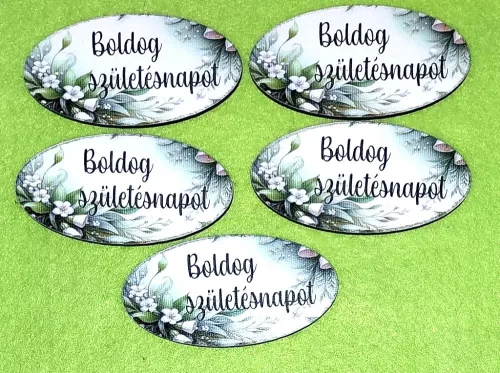  Nyomtatott fa alapú HDF(nem tömörfa) ovális tábla zöld virágos  hátér Boldog születésnapot felirattal 	5db/csomag	8x4cm vastagság 2,5mm	
