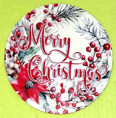 	Nyomtatott kerek kopogtató közép Mikulásvirágos Merry Christmas felirattal	1db	15cm vastagság 2,5mm	