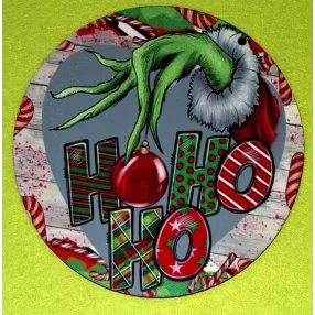   Nyomtatott kerek kopogtató közép Grincs kéz Ho-ho-ho felirattal 	1db	15cm vastagság 2,5mm	
