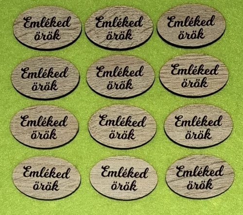 Nyomtatott ovális tábla  barna deszkás háttér, Emléked örök felirattal  	12db/cs 	4x2,5 vastagság 2,5mm	