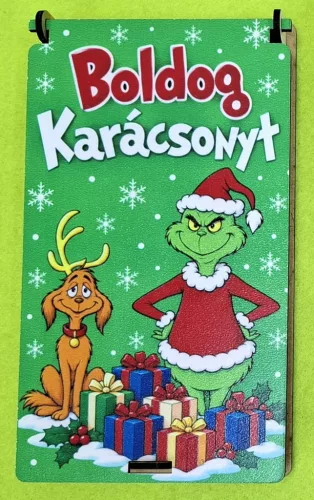 Nyomtatott ,lapraszerelt  pénzátadó doboz, grincs ajándék dobozzal ,Boldog Karácsonyt   felirattal	1szett	10x18cm magasság 1,5cm  vastagság 3mm	
