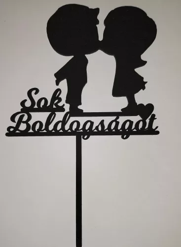 Fekete színű,nyír rétegelt lemez beszúrós dísz Kis fiú kis lány Sok Boldogságot felirattal 	1db/csomag	11x17,5cm 