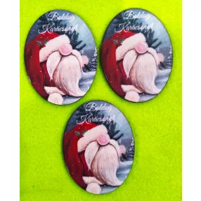    Nyomtatott fa Ovális tábla Piros sapkás manó Boldog Karácsonyt felirattal	3db/ csomag 	8,5x6,5cm