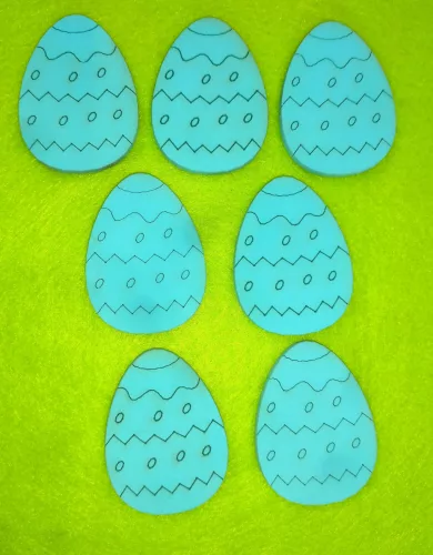 Világoskék  fa   tojás	7db/csomag	4x5,3cm 