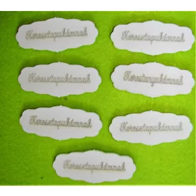   Fehér színű ,fa  alapú HDF(nem tömörfa)  Keresztapukámnak	 7db/csomag	7x3 cm