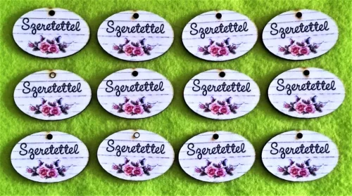 3x4,5 cm Ovális  , Nyomtatott ,fa alapú HDF(nem tömörfa)    tábla Deszka háttérrel rózsával Szeretettel  felirattal	12db/csomag	 