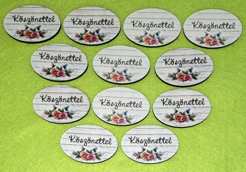 3x4,5 cm Ovális  , Nyomtatott ,fa alapú HDF(nem tömörfa) ,tábla Deszka háttérrel rózsával Köszönettel  felirattal	12db/csomag	