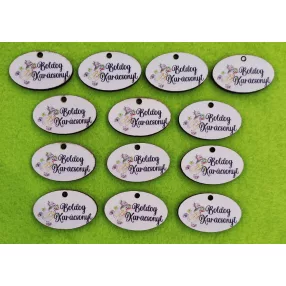    Nyomtatott fa ovális tábla korcsolyázós hóemberrel Boldog Karácsonyt felirattal	13db/csomag	4x2,5cm 