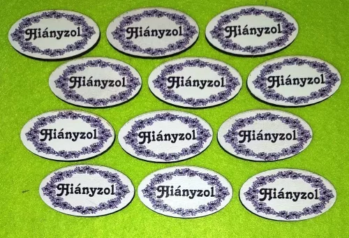 Nyomtatott fa  Kicsi  Fekete virág mintás ovális tábla Hiányzol felirattal	12db/csomag	4.5x2,5 cm 